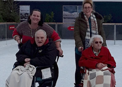 Residents and staff from Meyer House Care Home on the ice at a local ice skating rink