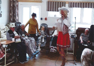 Jamie Steen at Meyer House Care Home, with his Dolly Parton tribute act