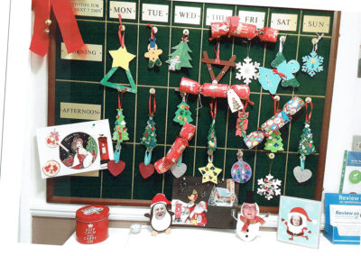 The Activities board at Meyer House Care Home decorated with Christmas decorations