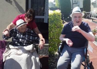 Meyer House Care Home residents dancing in their chairs to a live singer outside the Home in the sunshine
