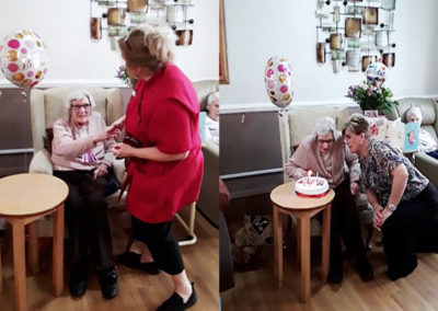 Resident Lucy celebrating her birthday at Meyer House Care Home with balloons