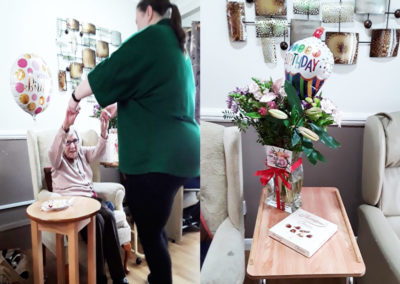 Resident Lucy celebrating 102nd birthday at Meyer House Care Home with flowers