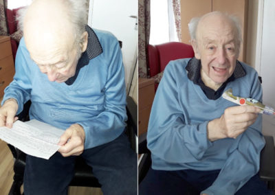 Meyer House Care Home resident Hugh receiving letters from Janet, and making gliders