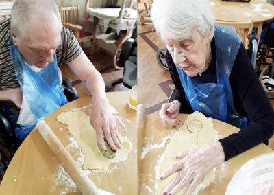 Residents cutting out the biscuits to bake at Meyer House