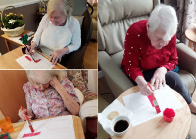 Meyer House Care Home residents painting St George's Day flags