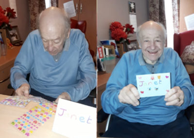 Meyer House Care Home resident Hugh making his wife Janet a card