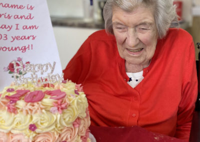 Meyer House Care Home resident with her birthday cake