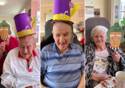 Meyer House Care Home residents posing for photos in Willy Wonka's hat