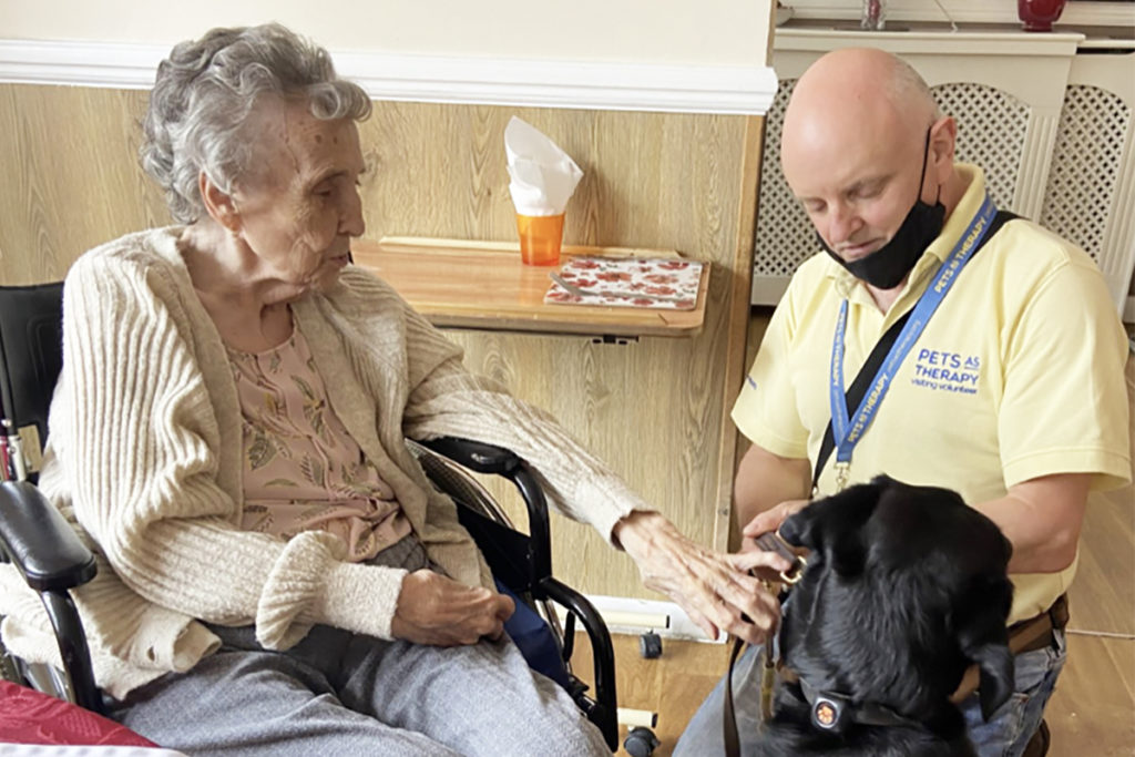 Pet Therapy dog Susie and her handler at Meyer House Care Home 