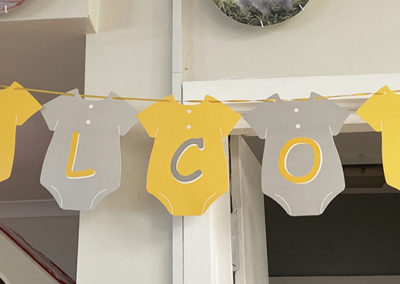 Baby shower welcome banner at Meyer House Care Home