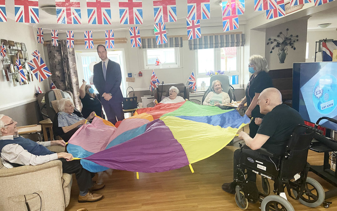 Meyer House Care Home residents enjoy parachute games to music