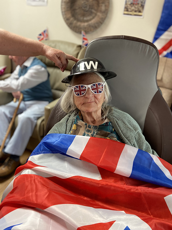 Meyer House Care Home resident dressed in a Union Jack