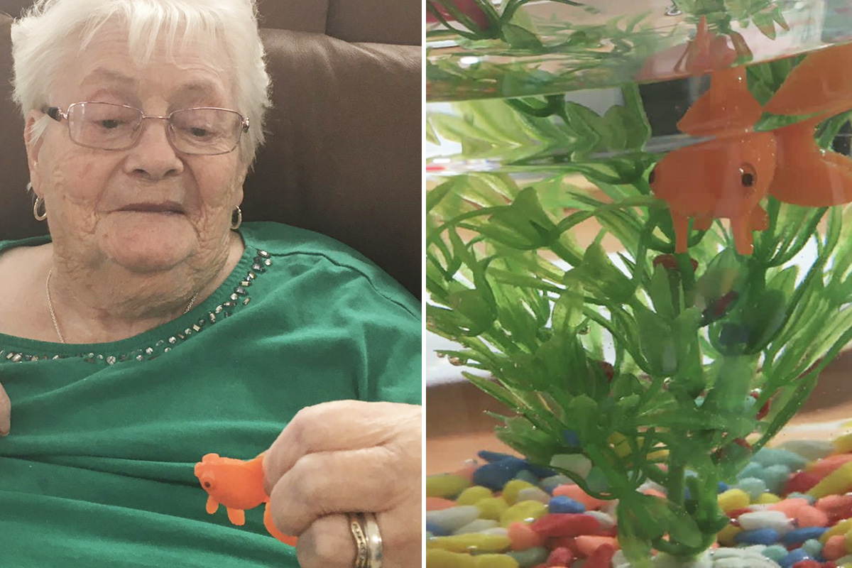 Meyer House Care Home resident with a craft fish