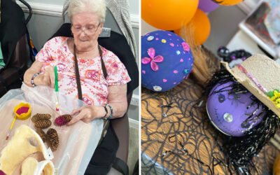 Painting pine cones and pumpkins at Meyer House Care Home